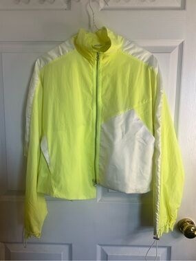 Puma neon yellow asymmetrical windbreaker